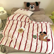 Cream-colored fleece duvet set with bold red stripes and embroidered bear for decorbites cozy autumn winter bedroom decor