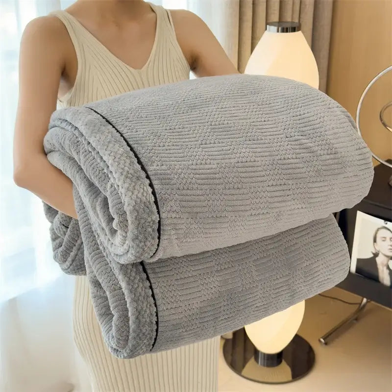 A cozy carved velvet gray corduroy blanket with soft fleece lining and black stitched edges for bedroom decorbites cozy carved use