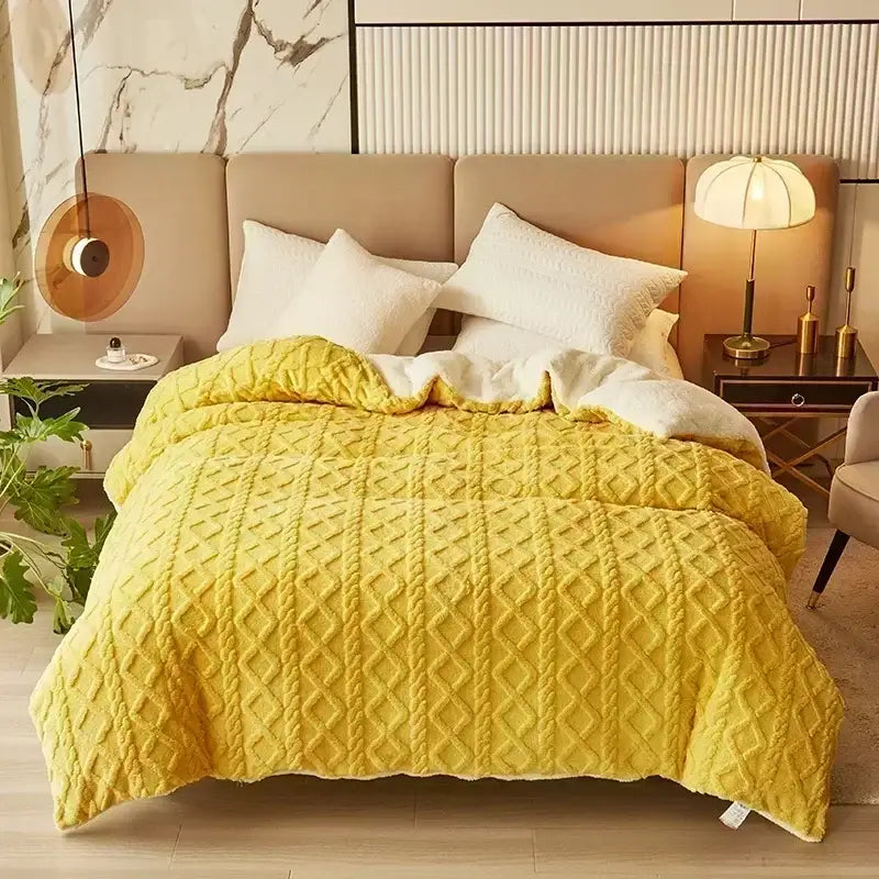 Vibrant yellow quilted duvet cover with textured diamond pattern made of cozy cashmere blanket fleece fabric