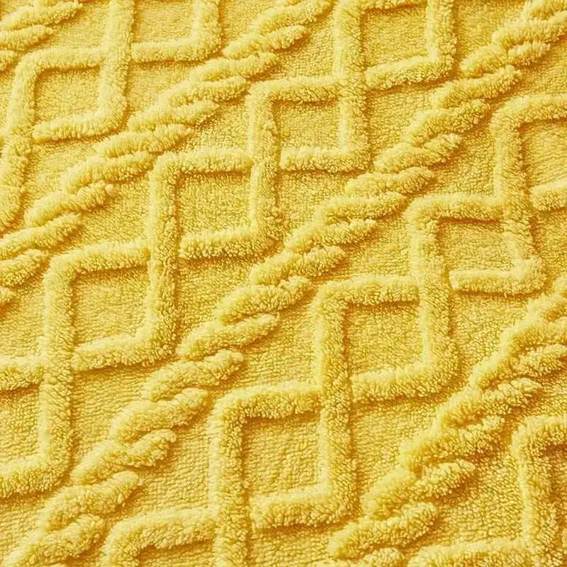 Yellow plush cashmere blanket duvet cover with raised geometric diamond pattern for cozy bedroom use
