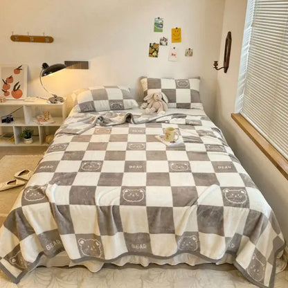 Gray and white checkered fleece blanket with embroidered bear faces and word bear perfect for decorbites cozy checkered throw