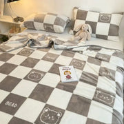 Cozy checkered fleece blanket in gray and white with embroidered bear faces and bear text for bedroom decorbites cozy checkered