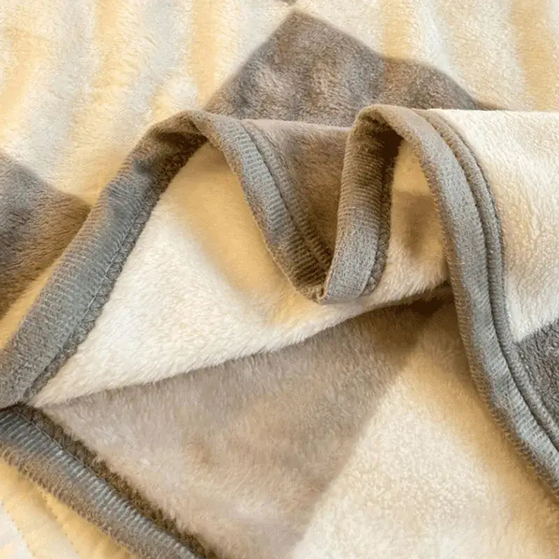 A decorbites cozy checkered fleece blanket in beige and gray stripes with textured border for bedroom decor