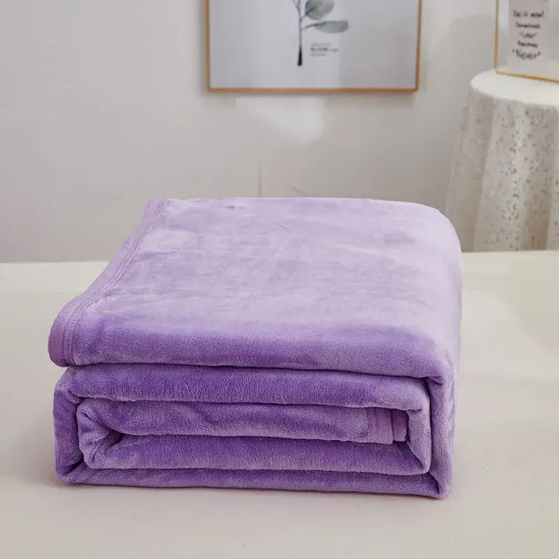 A plush lavender fleece blanket neatly folded featuring cozy checkered fleece material for bear bedroom decorbites throw