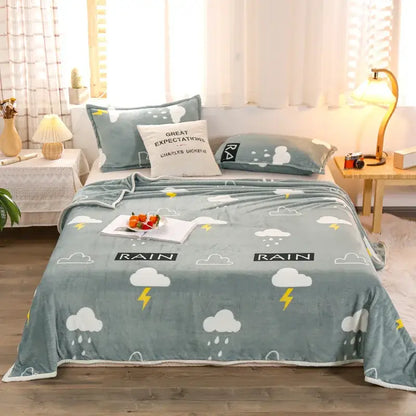 Soft teal decorbites cozy checkered fleece blanket with white clouds and yellow lightning bolts for bedroom throw use
