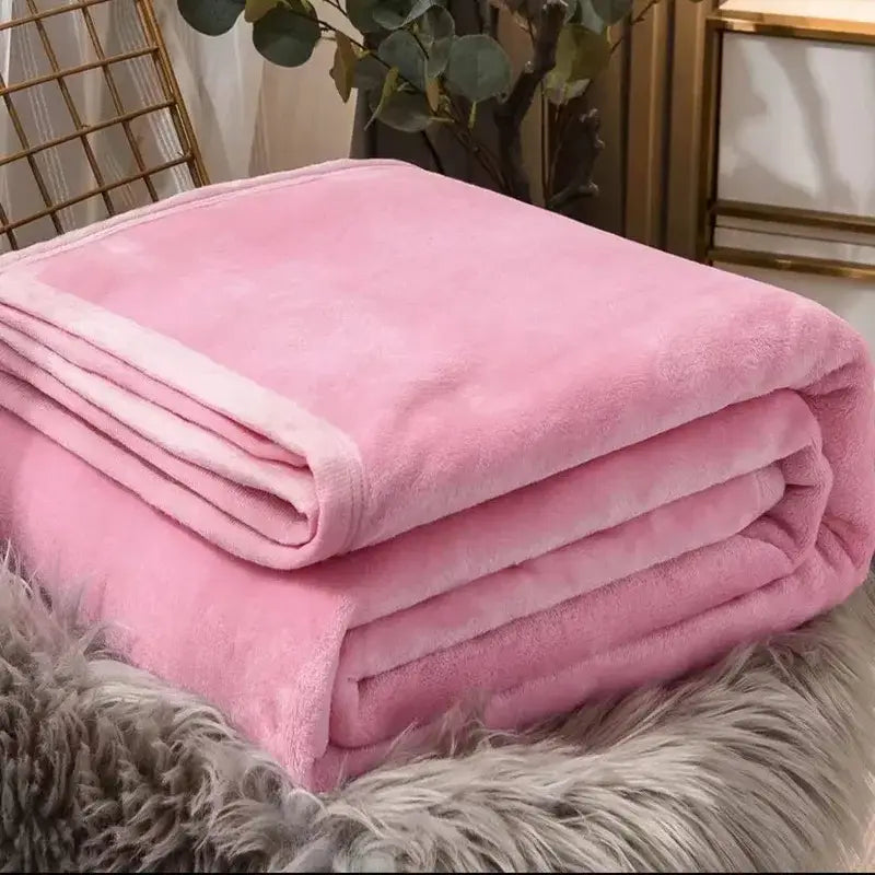 A decorbites cozy checkered pink fleece blanket with plush texture and neatly folded edges for bedroom use