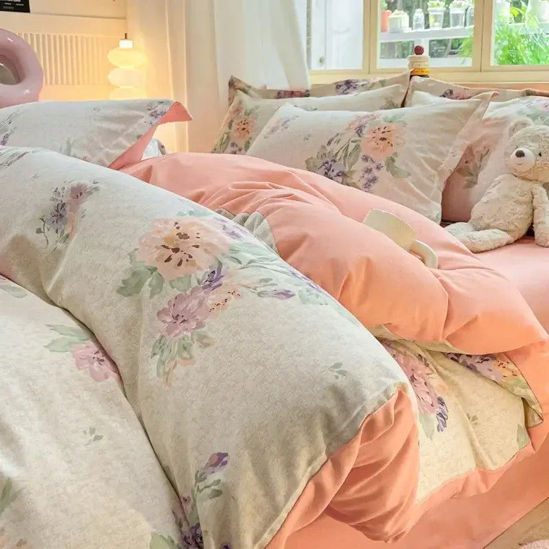 Pastel floral bedding set with soft peach cream tones on textured cotton fabric from decorbites cozy cotton bedding