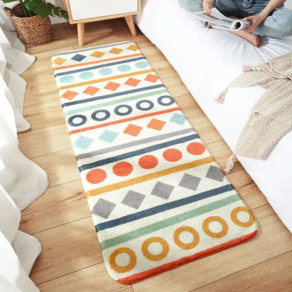 Colorful geometric-patterned cozy faux lamb bedside rug with plush texture in orange teal gray and cream stripes