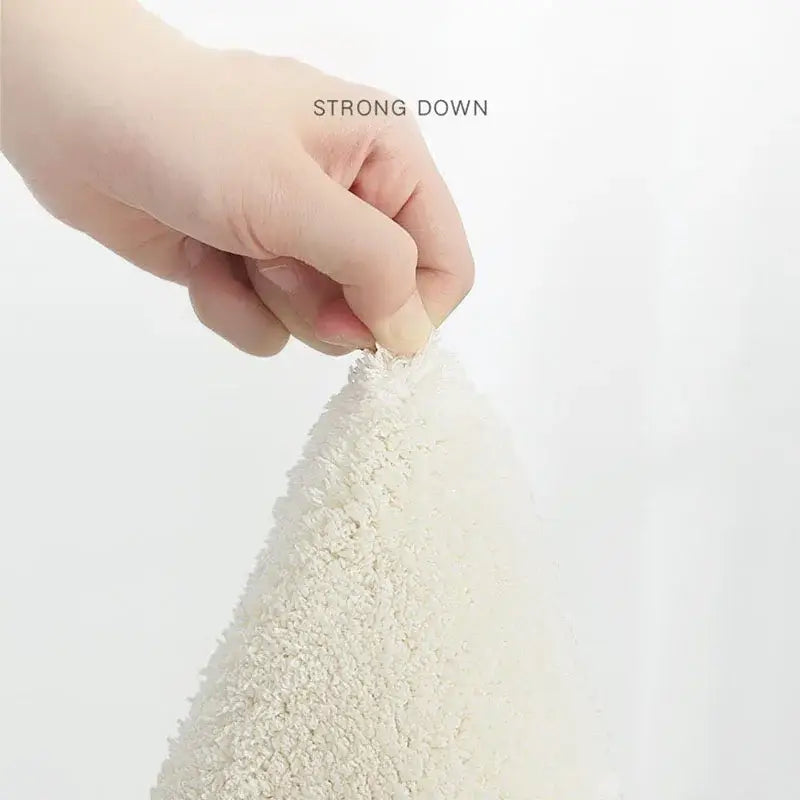 A plush off-white cozy faux lamb bedside rug with a soft textured surface for bedroom decorbites cozy faux decor