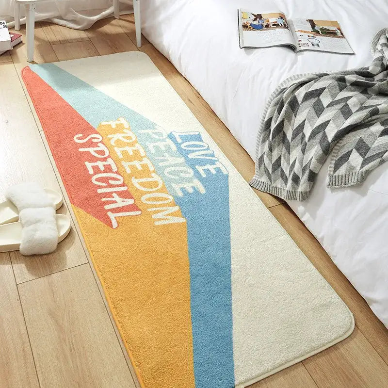 A cream-colored cozy faux lamb wool bedside rug with vibrant coral mustard and blue stripes and white text decorbites cozy faux