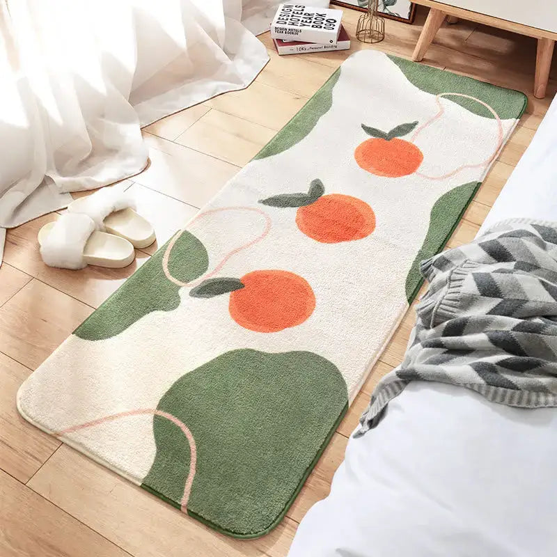 A cream-colored cozy faux lamb bedside rug with orange fruit pattern and green foliage for bedroom decorbites cozy faux