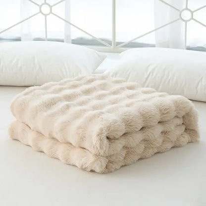 Cream-colored cozy faux rabbit velvet throw blanket with quilted textured surface for bedroom decorbites cozy faux use