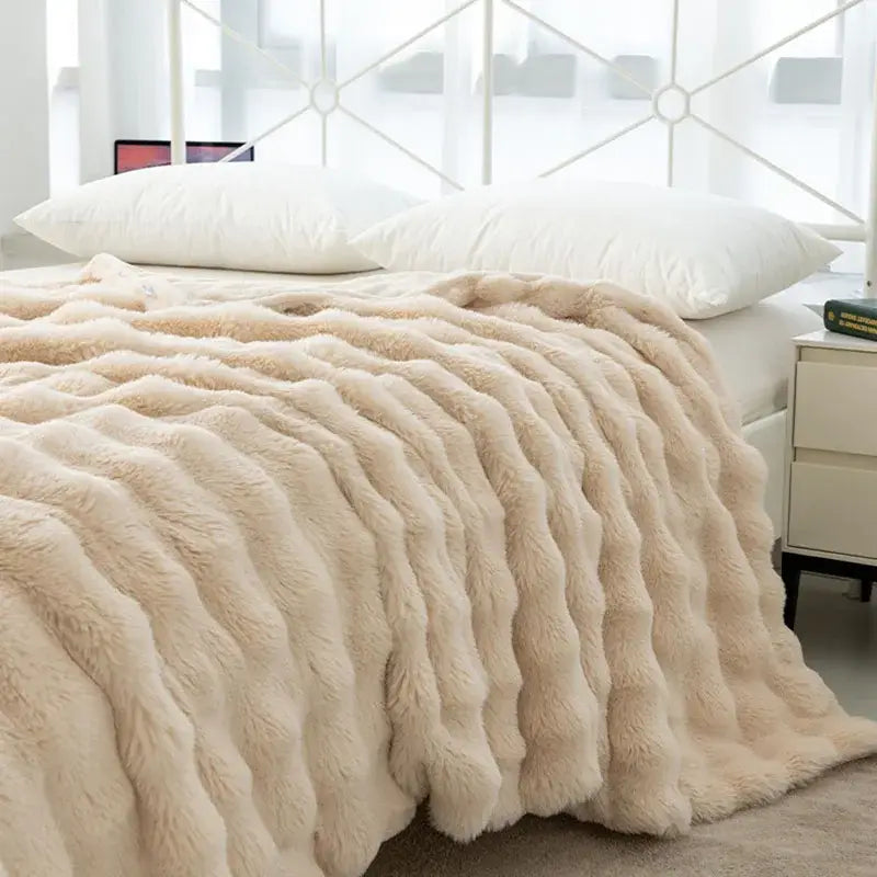 Cream-colored cozy faux rabbit velvet throw blanket with plush wavy texture for bedroom decorbites cozy faux use
