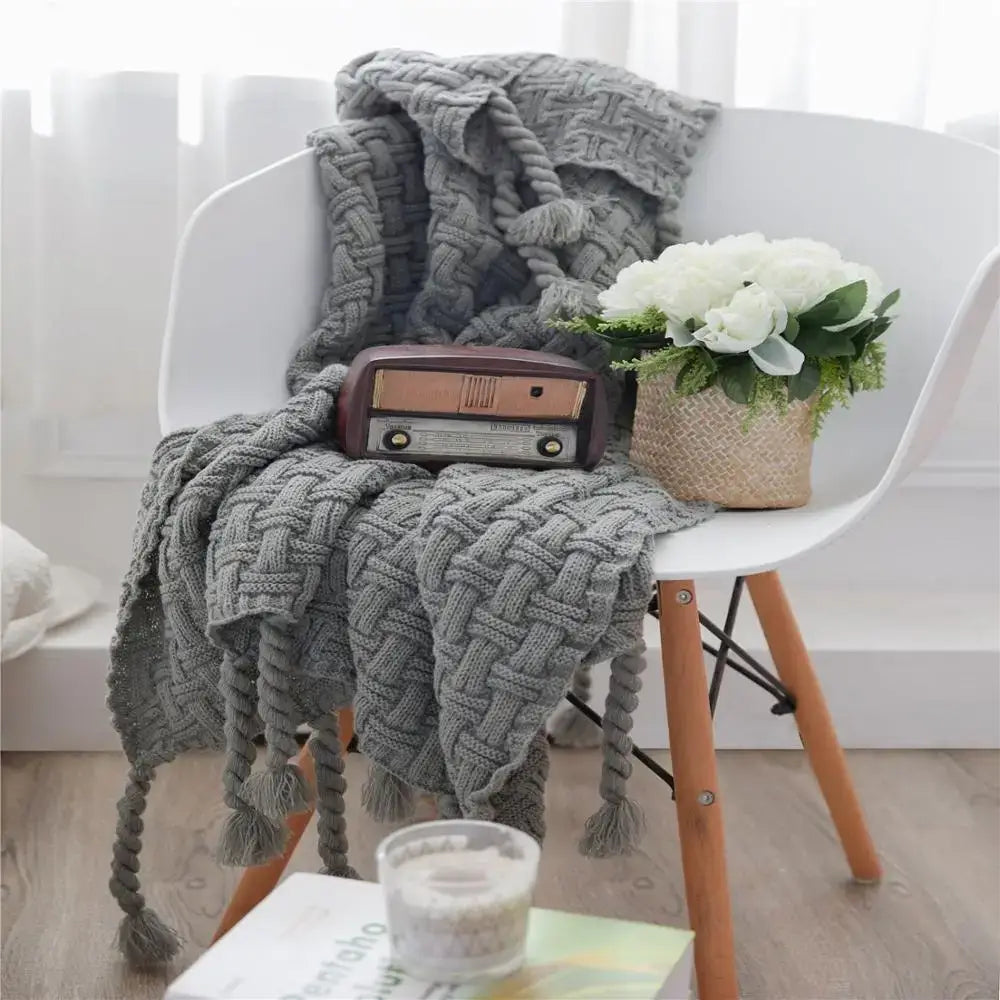 Gray knitted throw blanket with thick textured weave and tassels for decorbites cozy fringed plaid bedroom decor