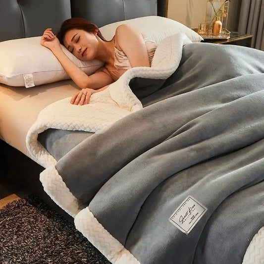 Soft gray fleece blanket with cream textured fleece border perfect for cozy winter fleece use in the bedroom