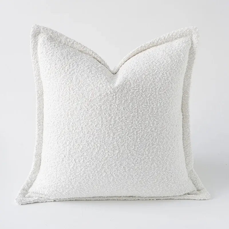 A cozy green handmade pillow cover with off-white textured tweed fabric and clean stitched edges for living room decorbites decor