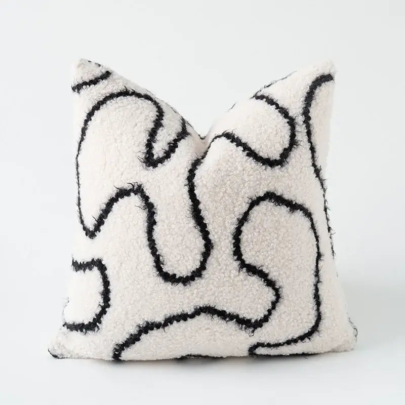 Cream-colored plush teddy bear style pillow cover with bold black abstract line art for decorbites cozy green decorbites cozy green handmade decor