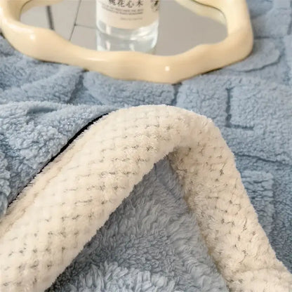 Soft blue and cream cozy jacquard taffeta flannel nap blanket with textured plush fleece surface for bedroom comforter decorbites