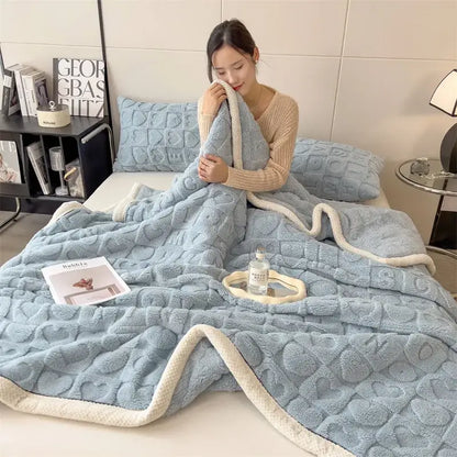 Soft light blue plush cozy jacquard taffeta flannel nap blanket with textured pattern and cream fleece border by decorbites