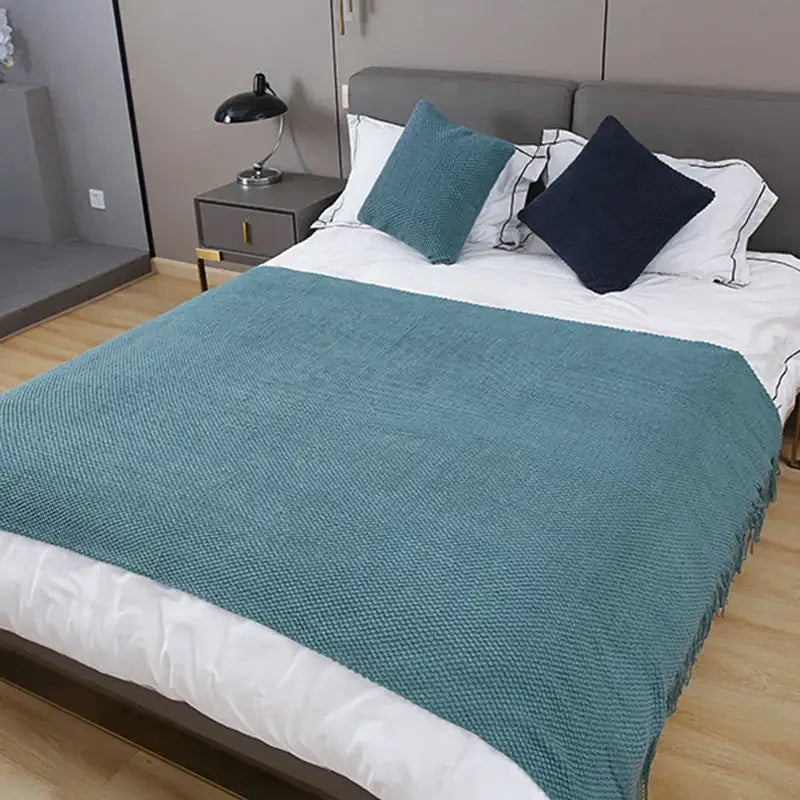 Teal textured decorbites cozy knitted sofa throw blanket with fringed edges ideal for living room decor