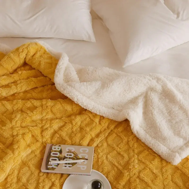 Cozy mustard yellow and cream coral fleece blanket with textured diamond pattern for bedroom sherpa throw use