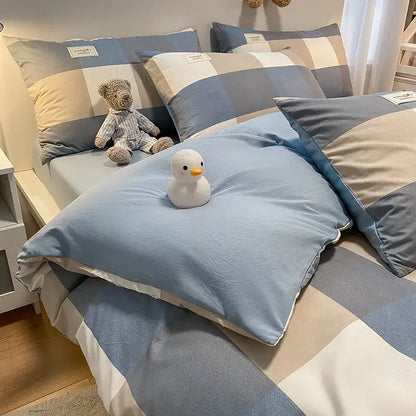 A soft light blue decorbites cozy plaid duvet cover with subtle textured weave for blue and white bedroom bedding set