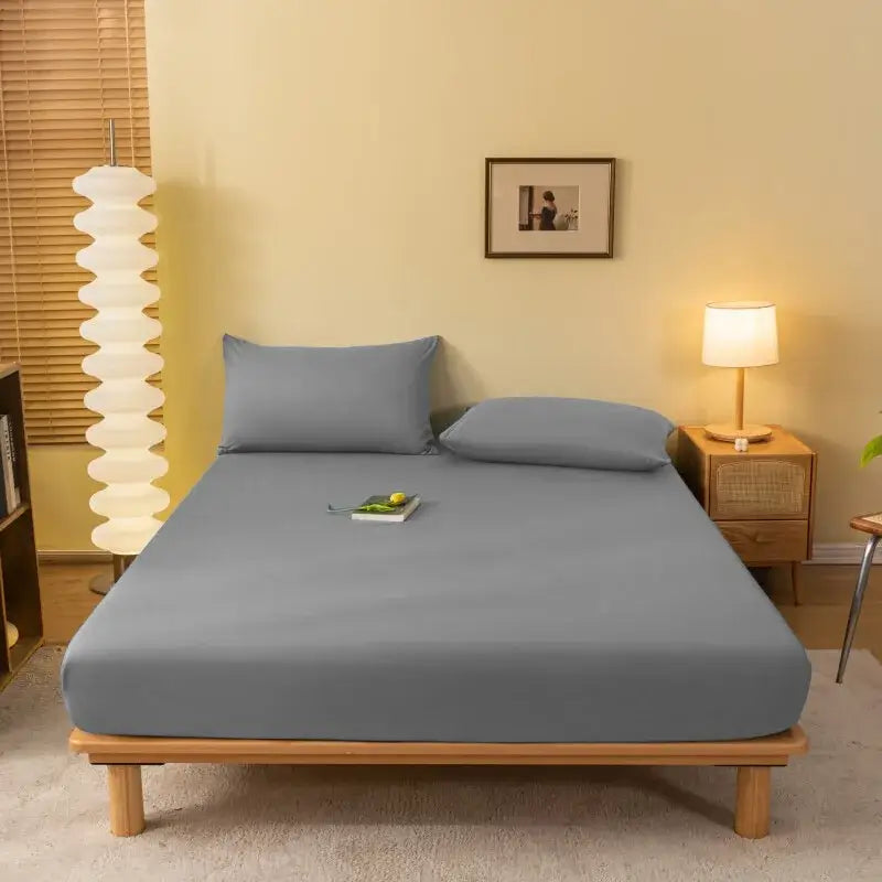 Cozy solid blue stretchy fitted sheet in slate blue with a smooth texture and snug fit over mattress decorbites cozy solid