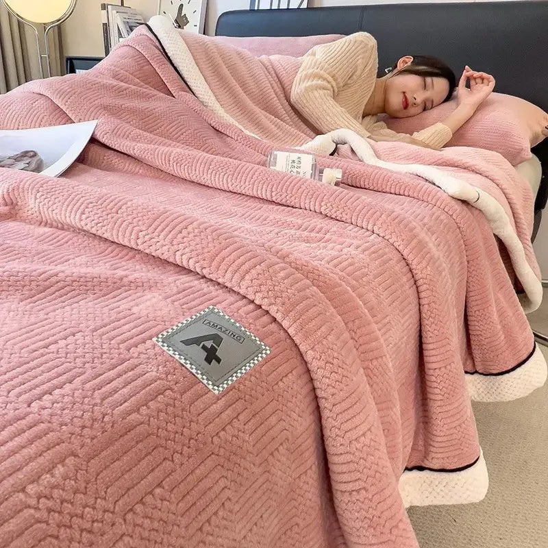 Pink plush blanket with textured quilted surface and white fleece lining for decorbites cozy striped knitted velvet use