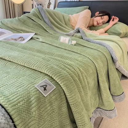 Soft mint green plush blanket with waffle weave and gray ribbed trim complementing decorbites cozy striped knitted velvet bedroom blanket in cream and black