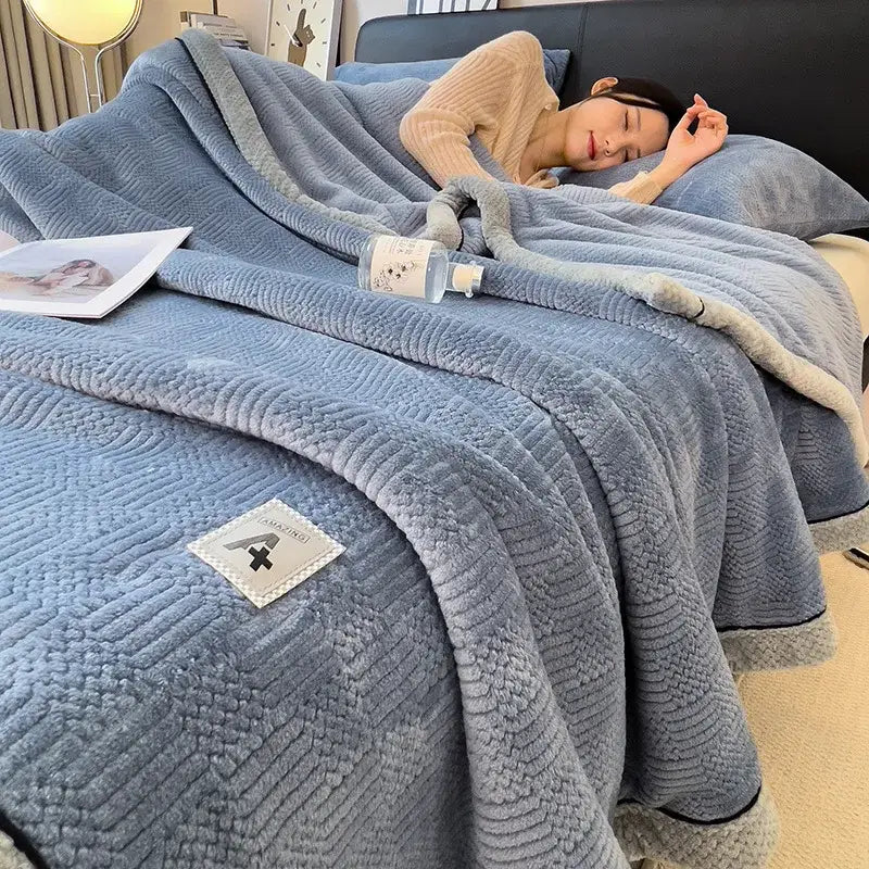Soft blue plush blanket with textured quilted pattern and gray fleece trim for decorbites cozy striped knitted velvet use