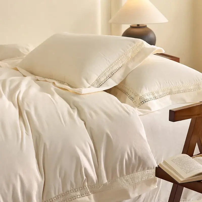 Cream-colored pillowcases with delicate lace trim from decorbites cozy velvet lace bedding set for elegant bedroom decor