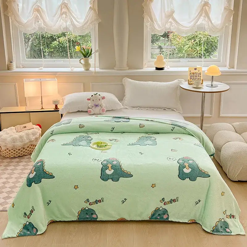 Cozy white fleece blanket with colorful flower patterns and a light green plush dinosaur print for bedroom decor