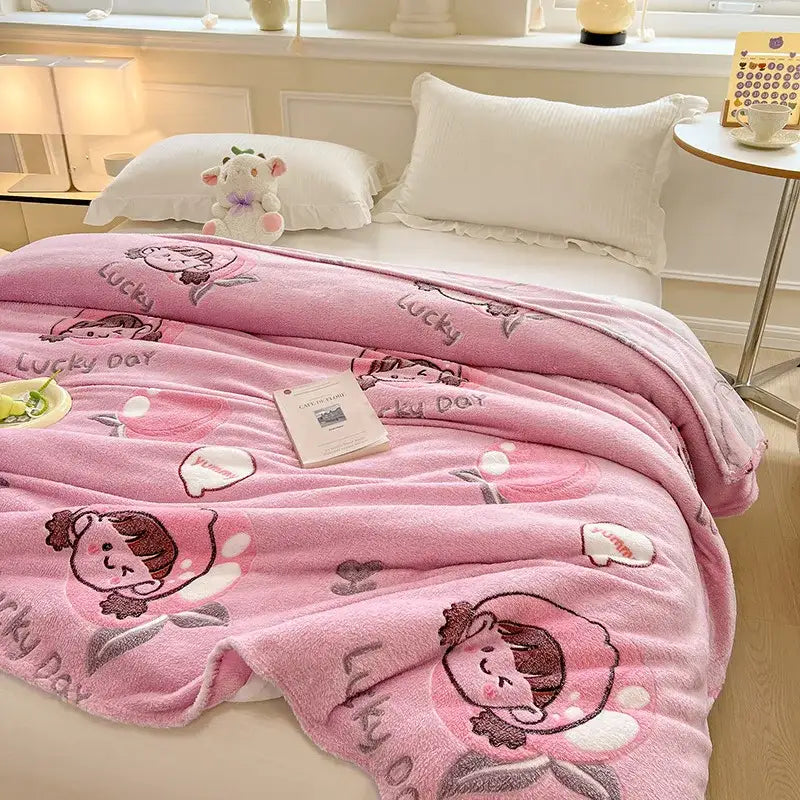 Pink plush blanket with cute cartoon girls and lucky day text featuring colorful flower patterns for cozy decor
