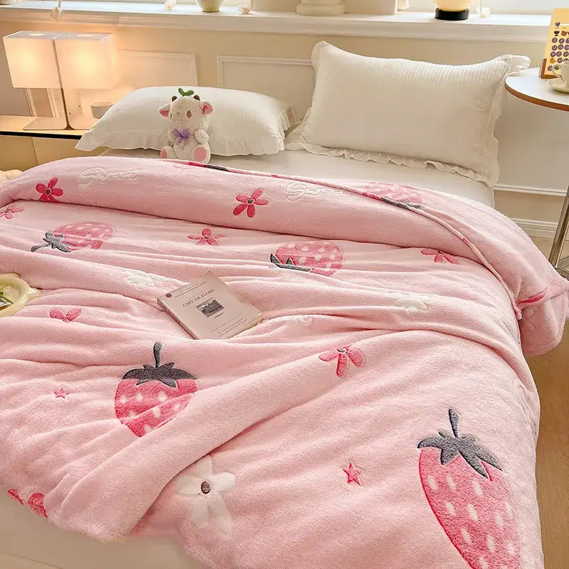 Cozy pink fleece blanket with embroidered strawberries and colorful flower patterns for bedroom decor