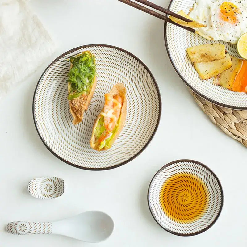 Crackle glaze blue ceramic dinner plate set featuring white ceramic dinner plates and spoons with black woven pattern decorbites ceramic dinner