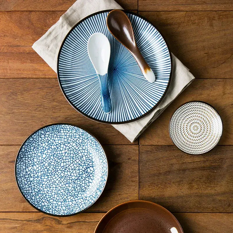 Blue ceramic dinner plate with crackle glaze radial stripes and black rim from decorbites ceramic dinner plate set