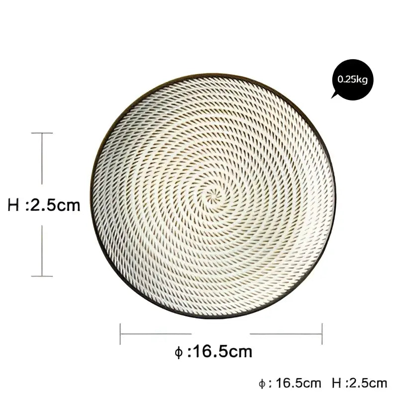 Circular light gray woven tray with spiral pattern and black rim paired with decorbites ceramic dinner plate set