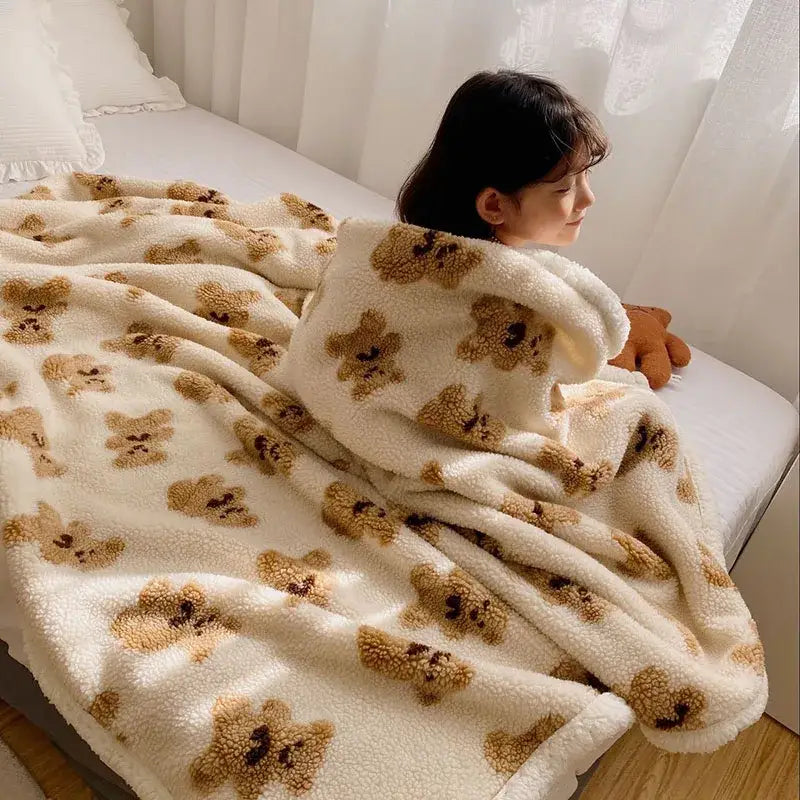 Cream and brown bear lamb plush blanket featuring a cream-colored plush texture with brown teddy bear patterns