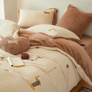 Cream and brown embroidered imitation cashmere bedding set featuring cream plush duvet with dachshund designs and brown pillow