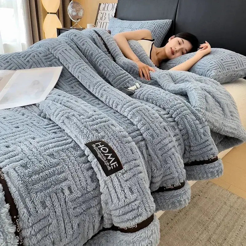 Soft gray plush decorbites fluffy fleece blanket with textured woven pattern and black trim for cozy bedroom decor