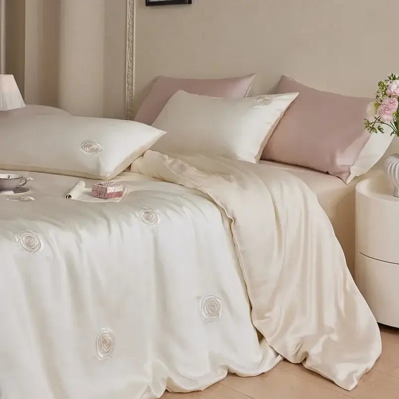 Cream satin duvet cover with delicate embroidered rose motifs in cream and green decorbites cartoon embroidery comforter set