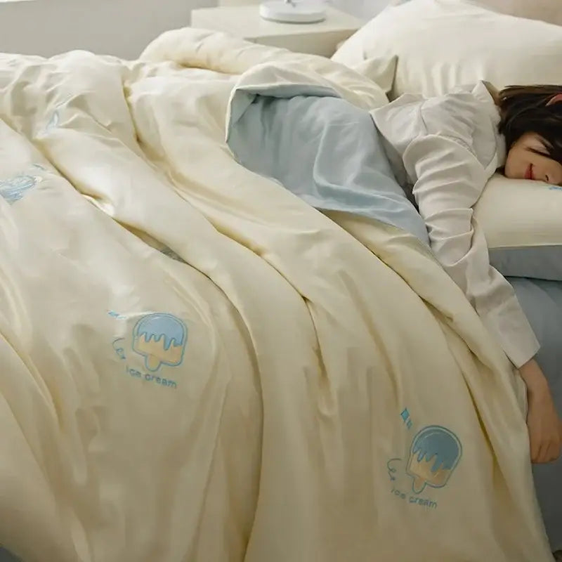 Cream-colored quilted comforter set with light blue ice cream decorbites cartoon embroidery for bedroom bedding