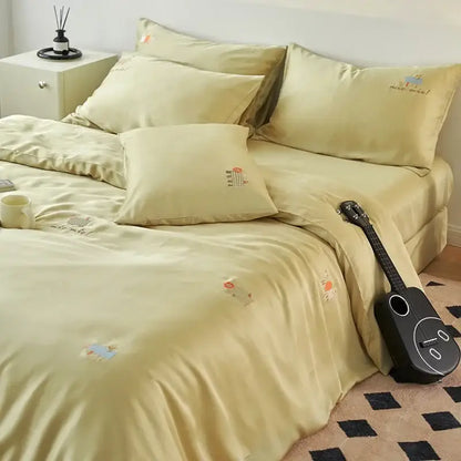 Soft pale yellow satin comforter set with delicate decorbites cartoon embroidery for bedroom bedding