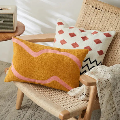 Mustard yellow rectangular embroidered cushion cover with soft pink wavy stitched border for living room decor