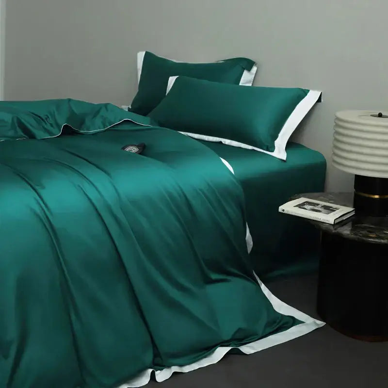 Emerald green satin bedding set with white trim in a cream and lavender egyptian cotton hotel style bedroom
