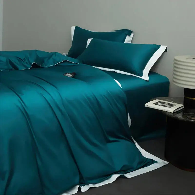 Teal satin bedding set with crisp white piping in cream and lavender egyptian cotton hotel style bedroom collection