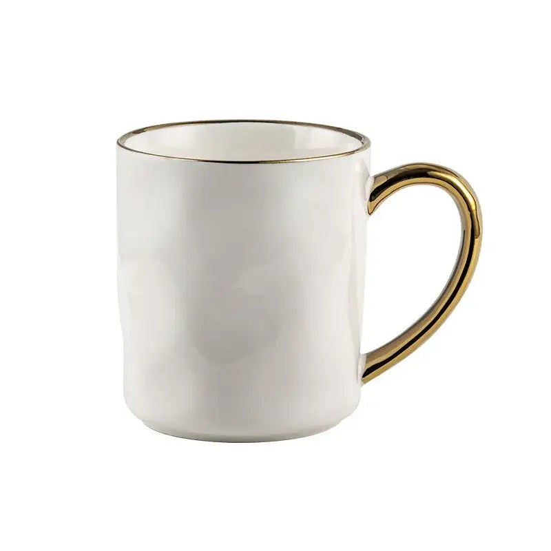 White ceramic gold rim mug with nordic gold rim and handle from cream and navy gold rim mug set for coffee use
