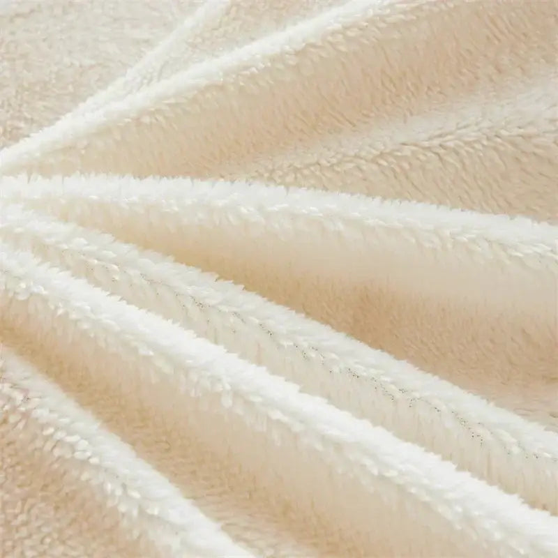 Cream and tan cozy checkerboard cashmere weighted blanket with cream-colored plush fleece and stitched edges by decorbites
