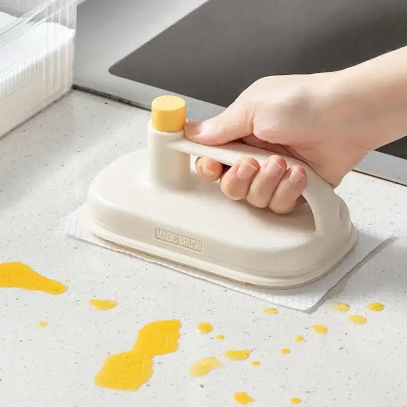 Cream and yellow silicone kitchen cleaning brush with replaceable head made of plastic for efficient kitchen cleaning