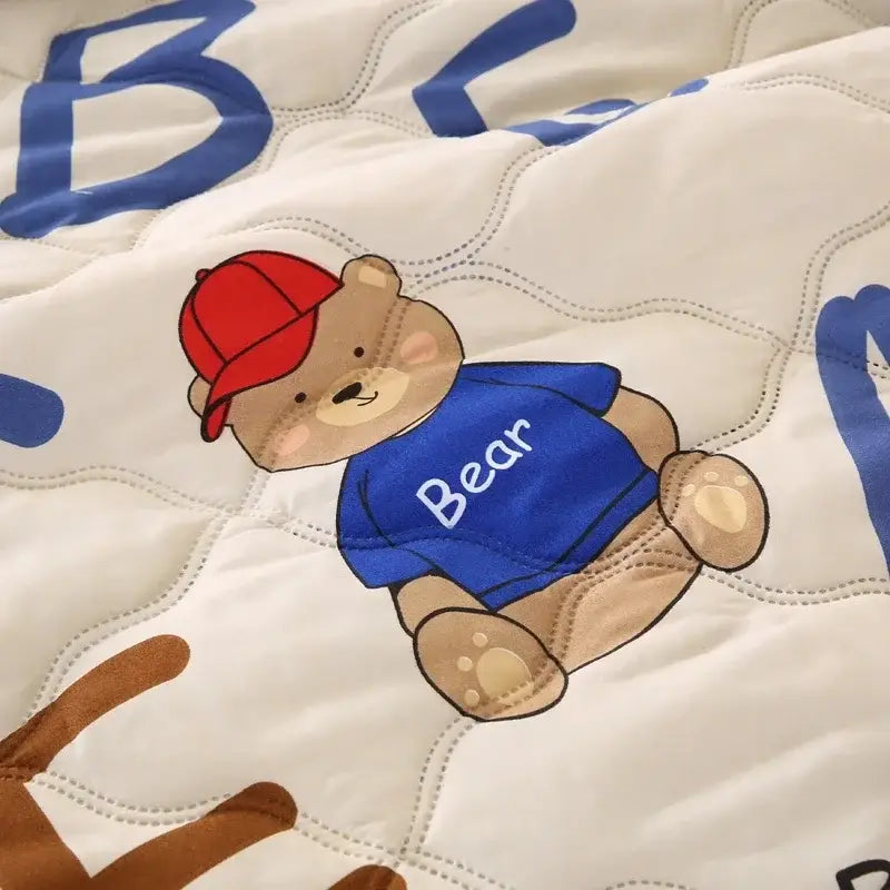Cream bear quilt and pillowcase set in cream featuring a cartoon bear with embroidered details for bedroom bedding set